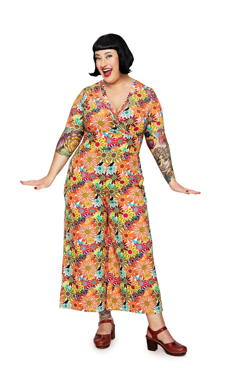 Cissi och Selma Britta byxdress Fågeltivoli Orange | mönstrad jumpsuit i ekologisk bomull