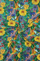Ekologiskt trikåtyg Illusion Färgglad blommigt 70-tals mönstrat tyg