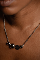Sägen Solar necklace in silver | Statement necklace in silver and black