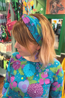 Hedda hårband Trädgård Lila - Headband in petrol and purple floral print
