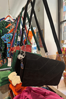 Shoulder strap bag in black suede