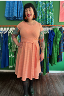Cissi och Selma Hilda dress with orange stripes - feminine summer dress in cotton tricot