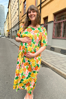 Cissi och Selma Ida dress Humlesurr Orange | Floral print midi summer dress in cool lyocell