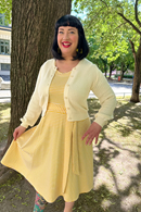 Cissi och Selma Hilda dress with yellow stripes - feminine summer dress in cotton tricot