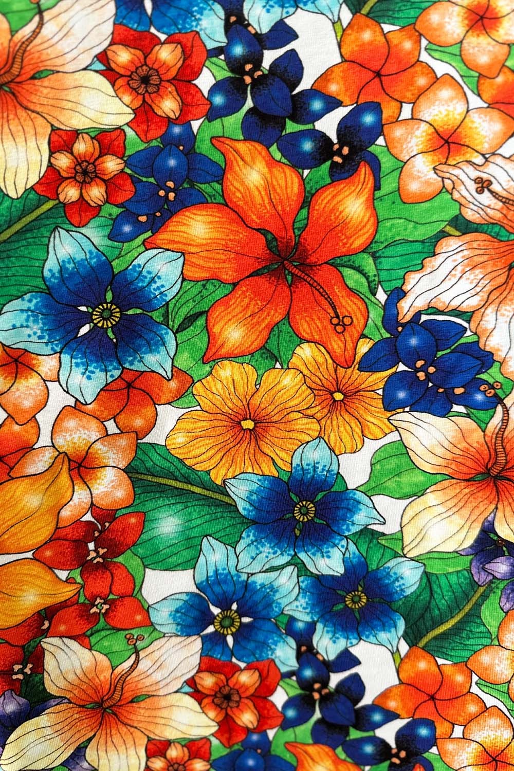 Cissi och Selma Organic jersey fabric Blomster Orange