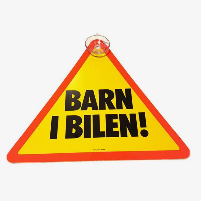 Barn i bilen skylt