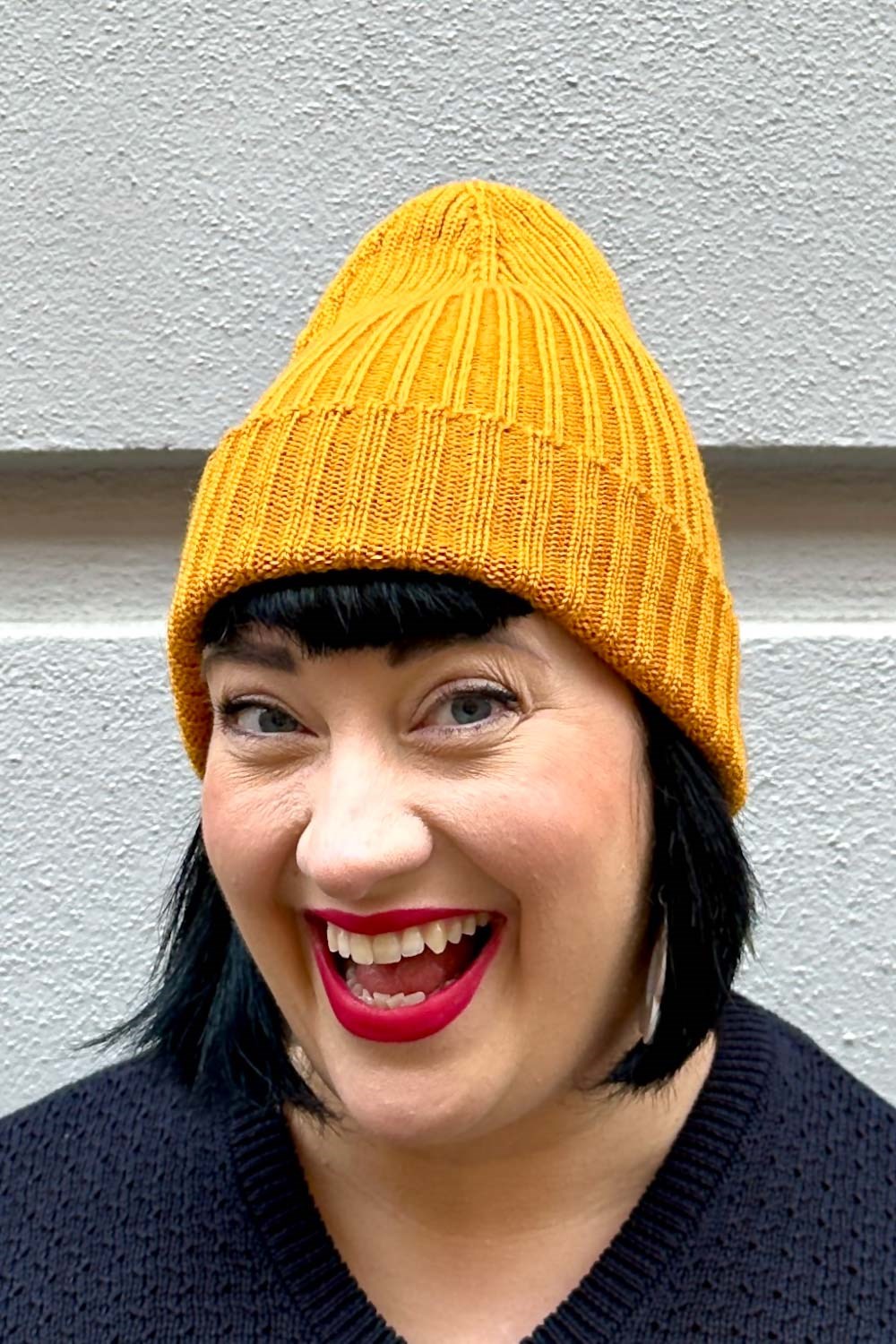 Ribbstickad mössa ull saffron