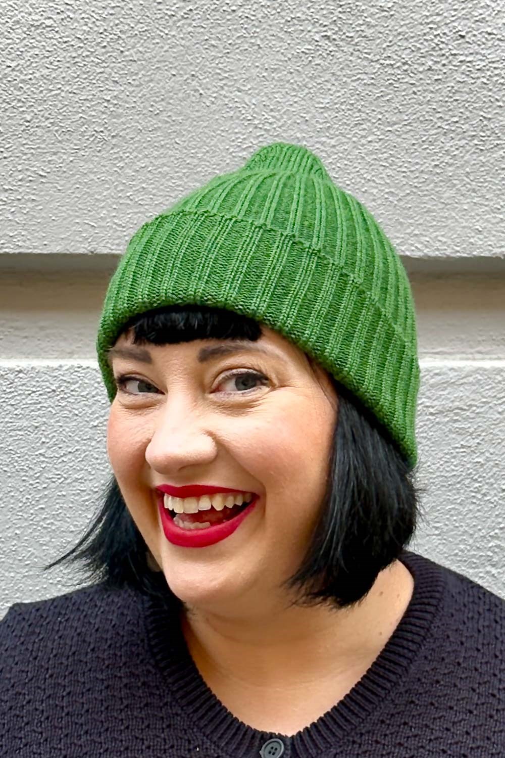 Ribbstickad mössa ull Klargrön