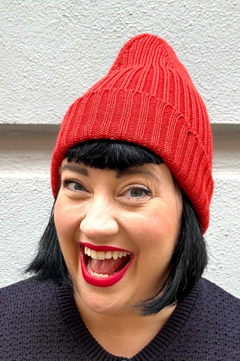 Ribbstickad mössa ull Ljusröd