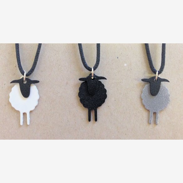 CHARM SHEEP WITH LEATHER RIBBON