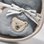 Steiff Lio penguin with rattle and bib gift set, 22 cm