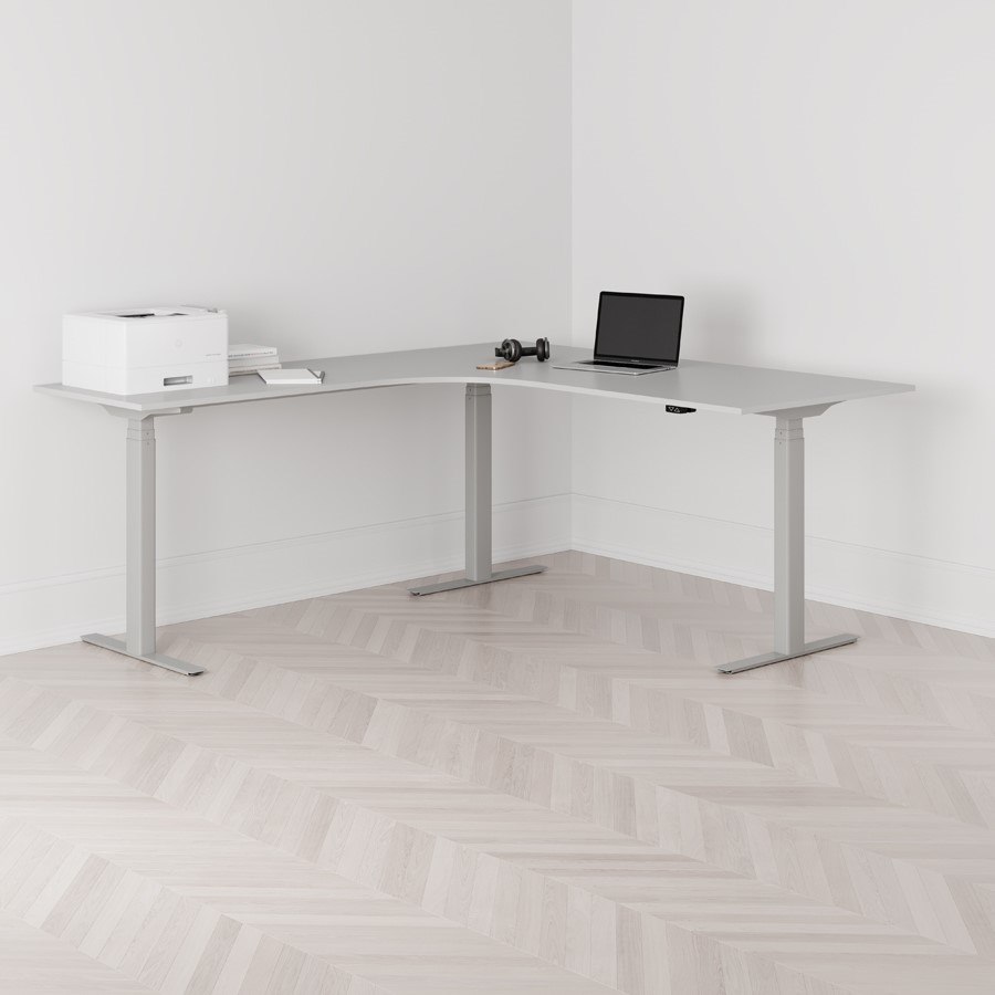 Höj och sänkbart hörnskrivbord vänstersvängt grått stativ grå bordsskiva 180x200cm
