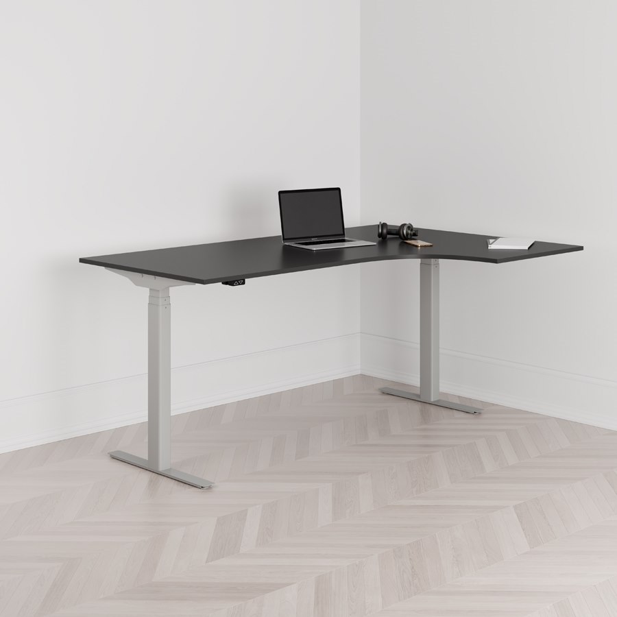 Höj och sänkbart svängt skrivbord 2-motorigt högersvängt grått stativ svart bordsskiva 180x120cm