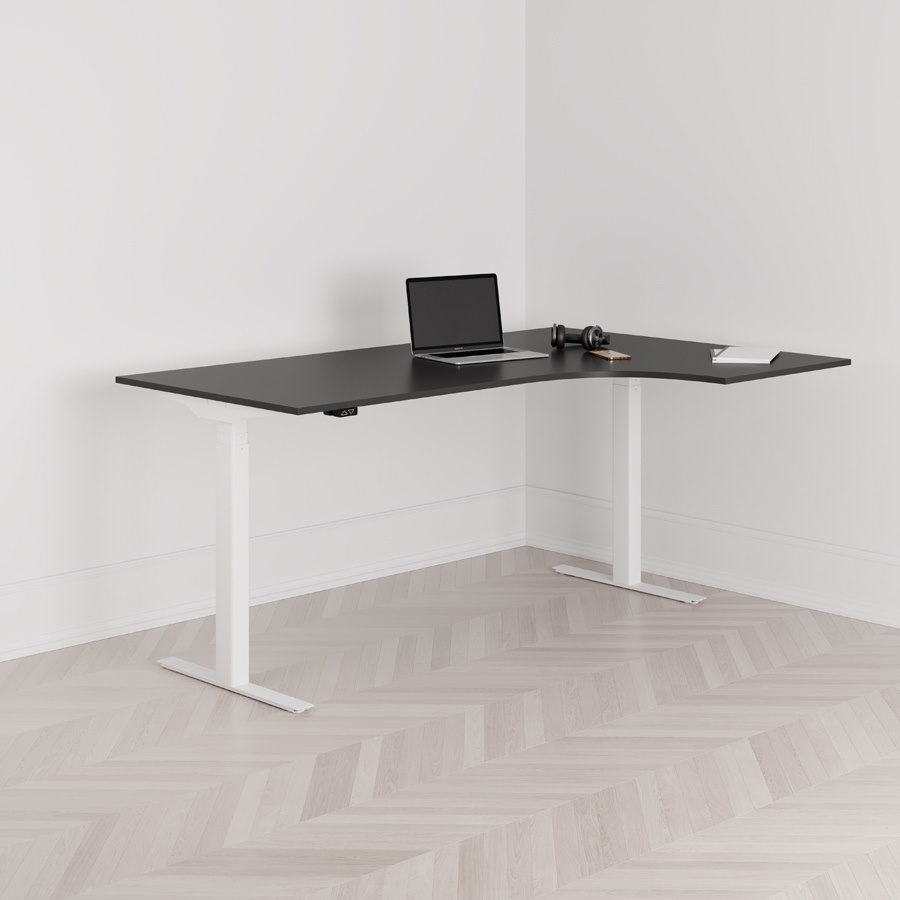 Höj och sänkbart svängt skrivbord 2-motorigt högersvängt vitt stativ svart bordsskiva 180x120cm