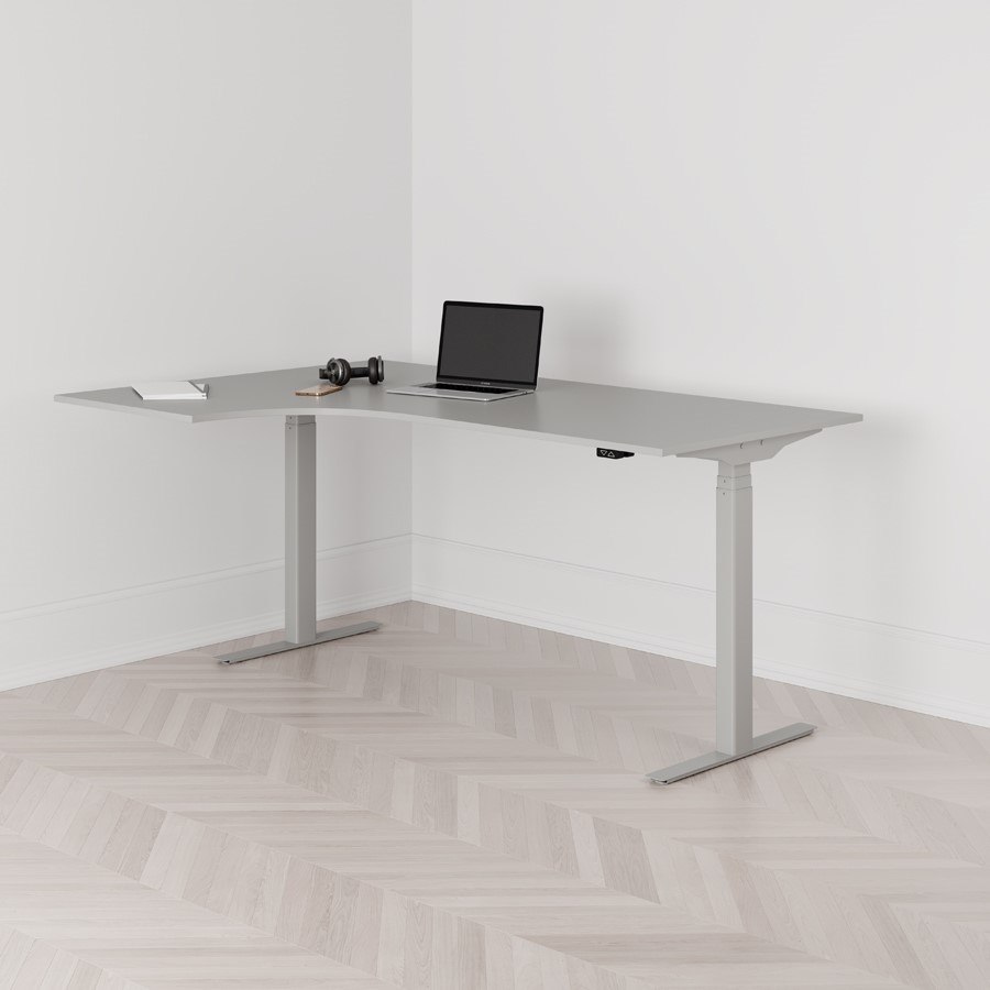 Höj och sänkbart svängt skrivbord 2-motorigt vänstersvängt grått stativ grå bordsskiva 180x120cm