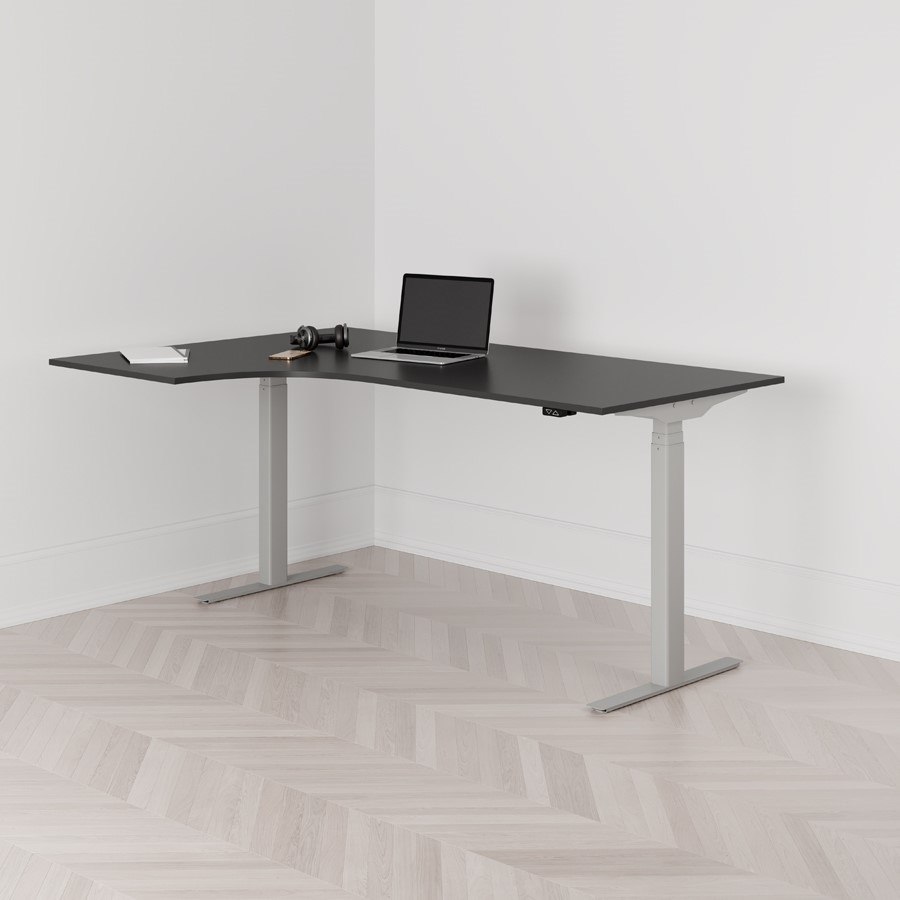 Höj och sänkbart svängt skrivbord 2-motorigt vänstersvängt grått stativ svart bordsskiva 180x120cm