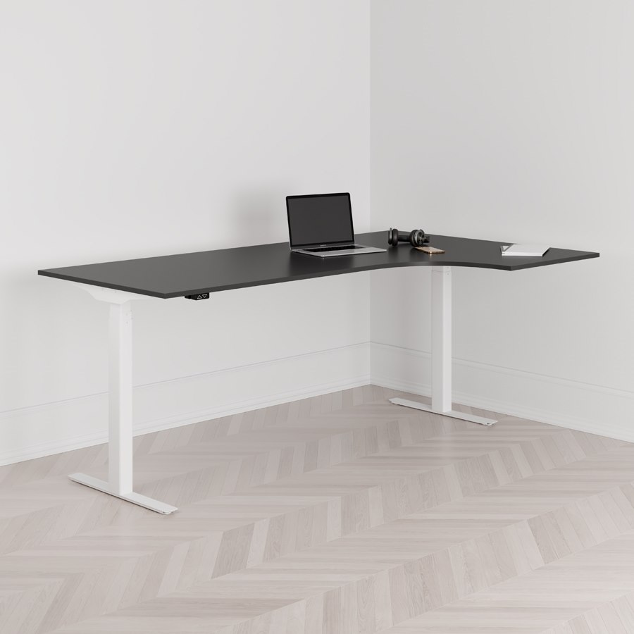 Höj och sänkbart svängt skrivbord 2-motorigt högersvängt vitt stativ svart bordsskiva 200x120cm