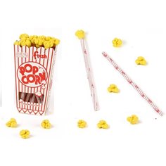 Popcornbägare med pennor och sudd