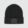X BEANIE