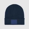 X BEANIE
