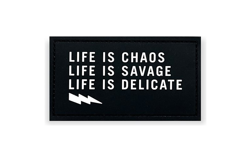 Gummimärke USWE Life Is Chaos Rubber Patch
